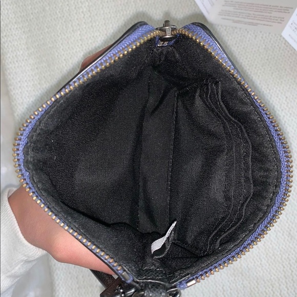 Star printed Coach wristlet. - Picture 2 of 3